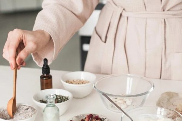 natural herbal remedies showcased by a woman making her own rosemary oil. Recommended by ECO Erin