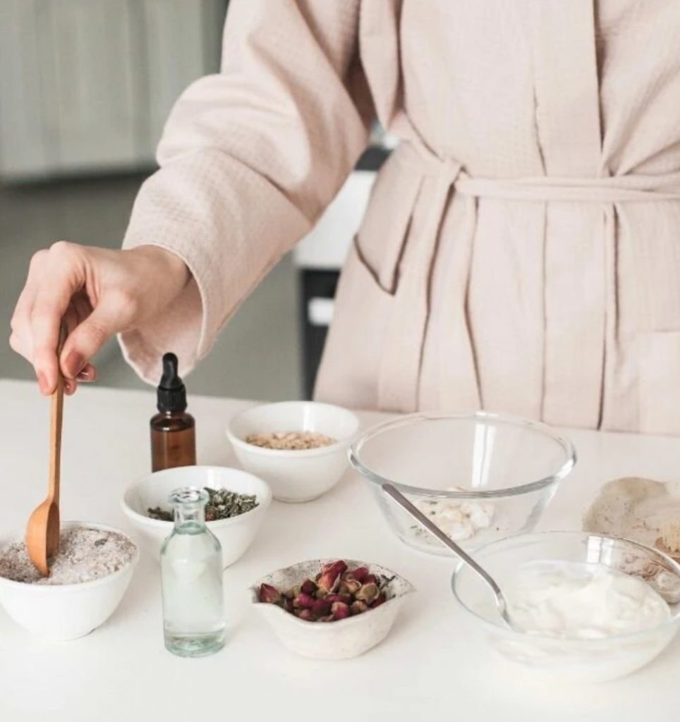 natural herbal remedies showcased by a woman making her own rosemary oil. Recommended by ECO Erin