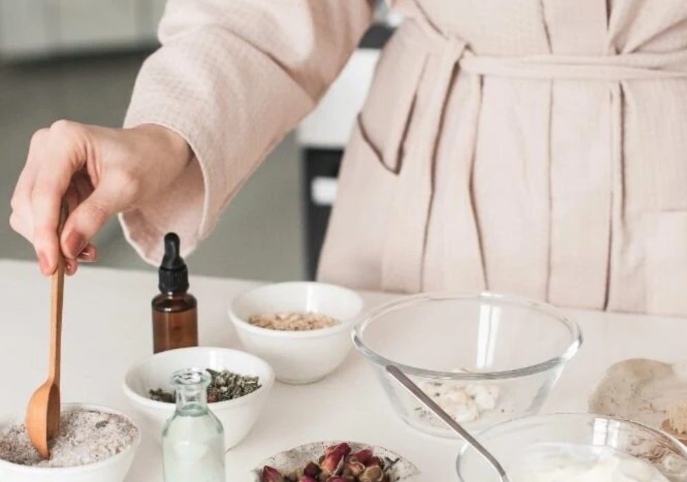 natural herbal remedies showcased by a woman making her own rosemary oil. Recommended by ECO Erin